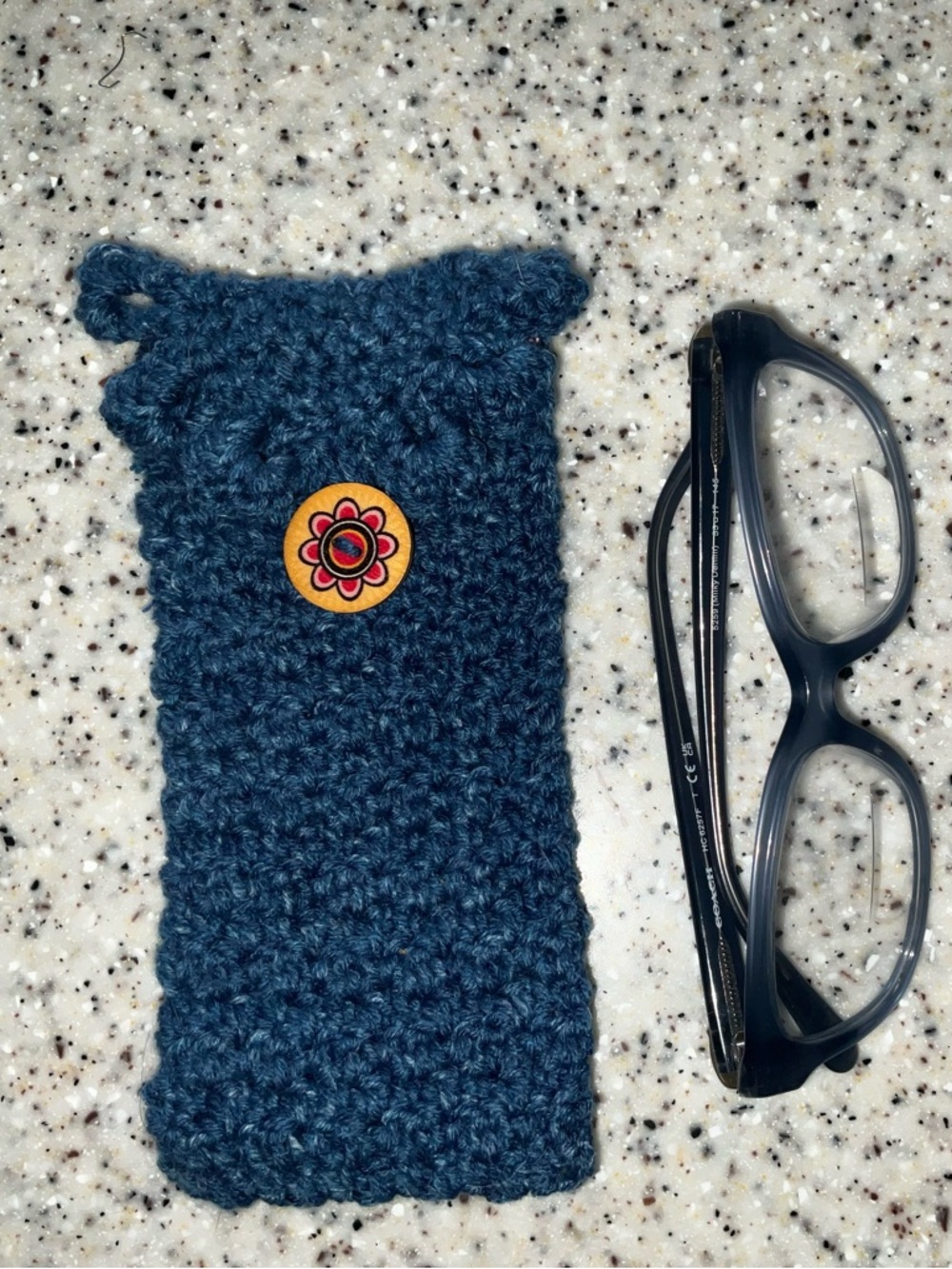 Handmade Denim Blue Crochet glasses pouch with decorative button.
